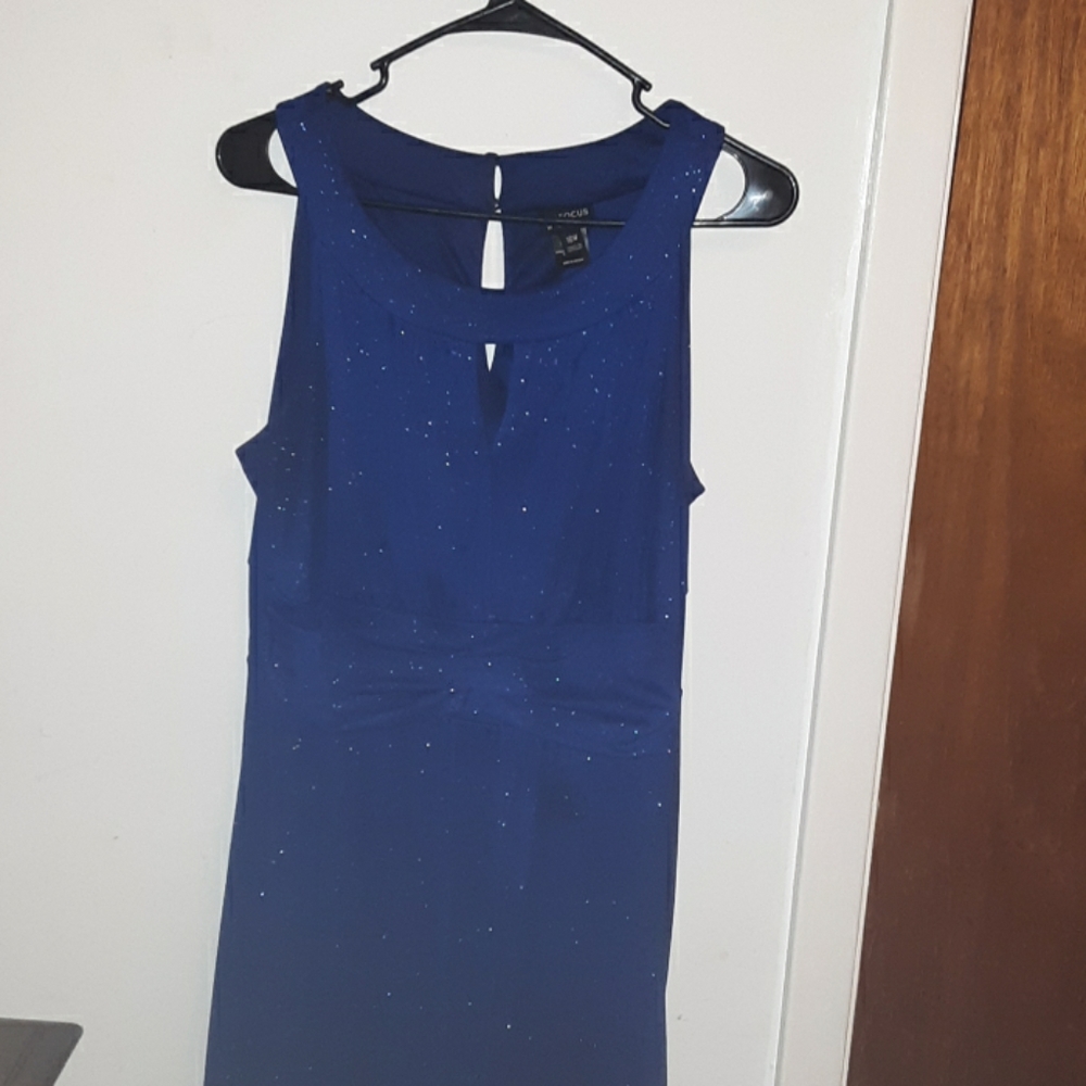 A long sparkly blue prom dress